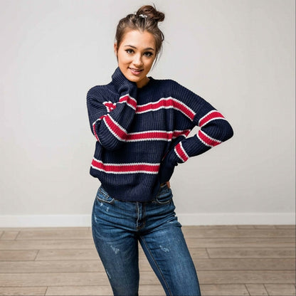 Pull en maille à rayures et manches chauve-souris