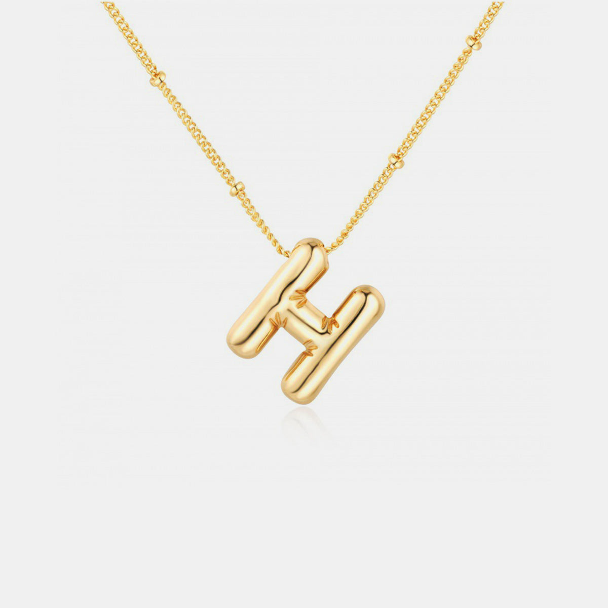 Collier pendentif lettre plaqué or