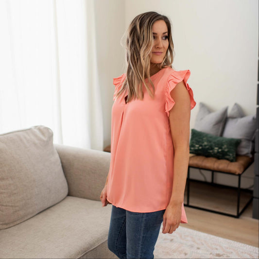 Haut asymétrique en laine tissée pêche à manches volantées