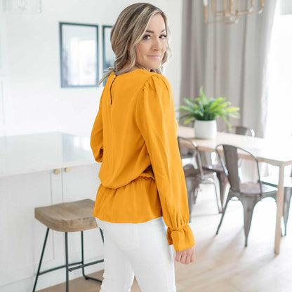 Chemisier à manches bouffantes en laine tissée couleur pêche