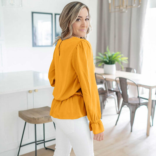 Chemisier à manches bouffantes en laine tissée couleur pêche