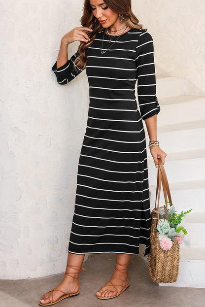 Robe mi-longue rayée fendue à col rond