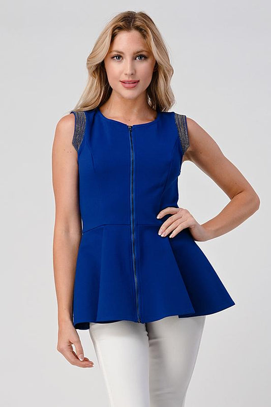 Top sin mangas con peplum, cremallera frontal y detalle metálico en los hombros