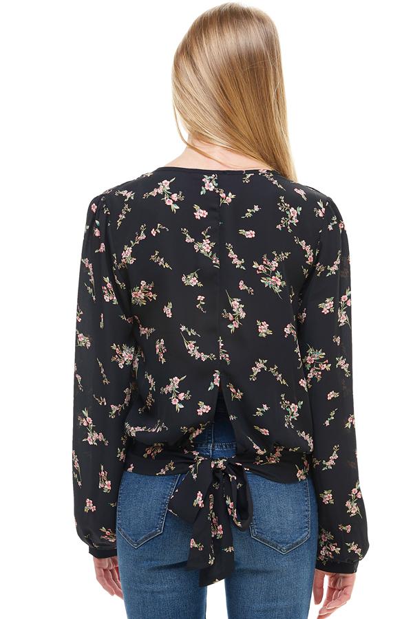 Top floral cruzado de manga larga