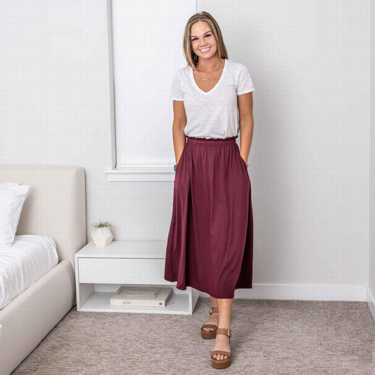 Falda midi con cintura paperbag y bolsillos