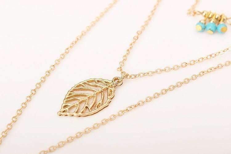 Collier multicouche en plumes de feuilles turquoise
