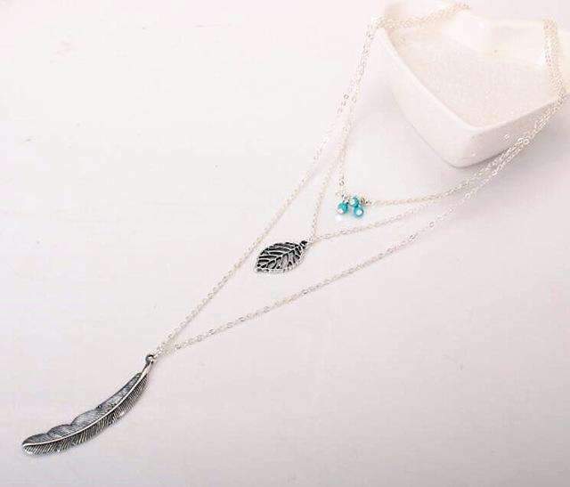 Collier multicouche en plumes de feuilles turquoise