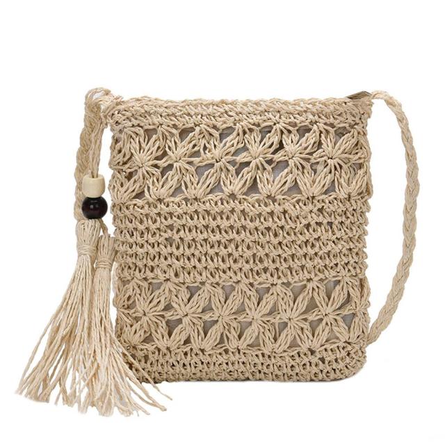 Petit sac bandoulière d'été en paille avec pompon